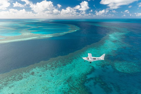 Great Barrier Reef Scenic Flight And Ocean Rafting Whitehaven Beach Day Trip - Geraldton Accommodation 3